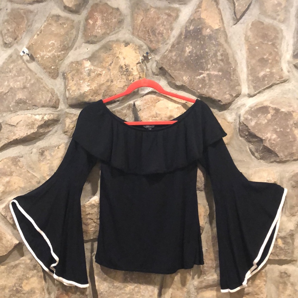 Off-the-shoulder black top with bell sleeves
